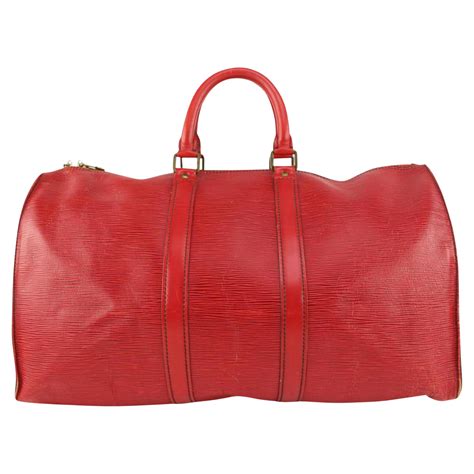 louis vuitton red epi duffle.